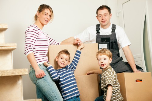 Local Crossness moving team planning a house relocation with packing supplies