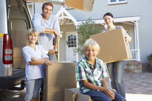 Packed household boxes and furniture ready for transport
