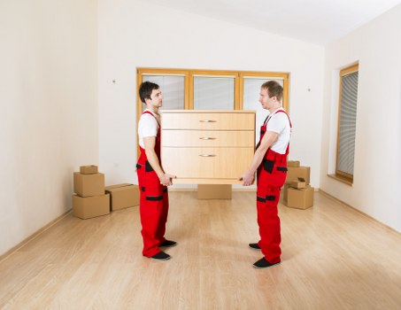 Trained staff member wearing PPE in a storage environment